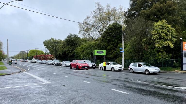 Cars wraps around the streets waiting for a Covid-19 test at the Claudelands Event Centre testing pop-up in Hamilton.