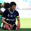 Hiroki Sakai of Auckland FC goes down injured during the round three A-League Men match between Auckland FC and Adelaide United at Go Media Stadium.