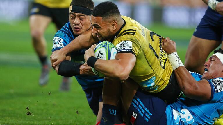 Hurricanes second-five Ngani Laumape scores a try in the tackle of Blues' halfback Augustine Pulu. Round 18 Super Rugby match, Hurricanes v Blues. Westpac Stadium, Wellington. Saturday 7th July 2018. © Copyright Photo: Grant Down / www.photosport.nz
