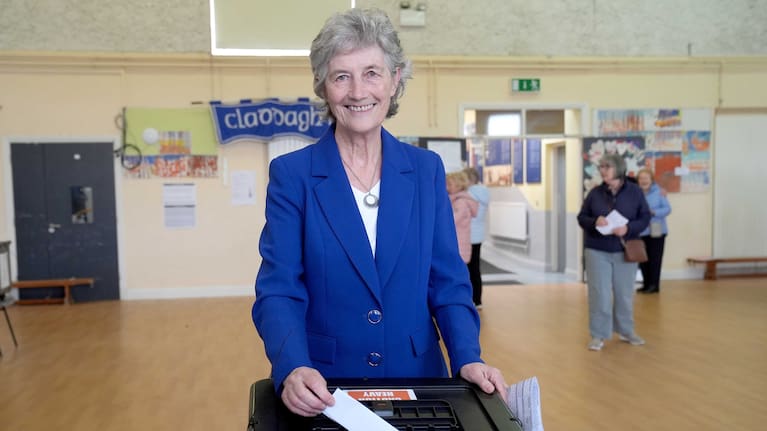 Independent candidate Catherine Connolly casts her vote in the election for the next Irish president at Claddagh National School in Galway, Ireland.
