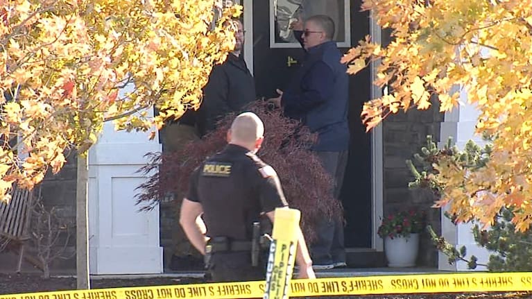 Investigators work at the site of the fatal shooting of house cleaner Maria Florinda Rios Perez, who went to the wrong address in Whitestown, Indianapolis. (Source: WRTV via AP)