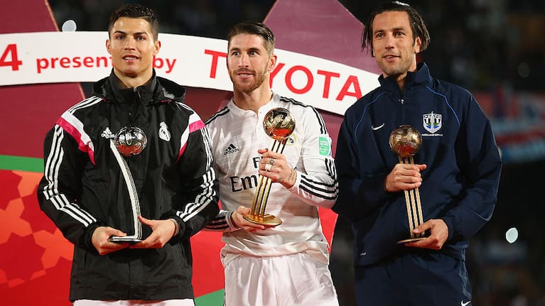 Ivan Vicelich (right), with Real Madrid's Cristiano Ronaldo (left) and Sergio Ramos (middle) at the FIFA Club World Cup in 2014.