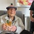 Jack Coe enjoys a beer on his 107th birthday.