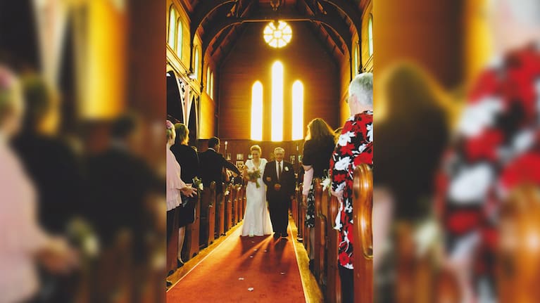 Jenny-May Clarkson is walked down the isle by her father Waka Coffin.