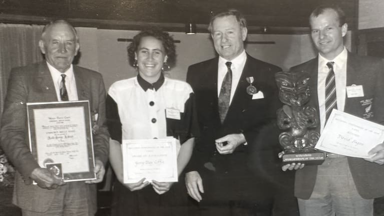Receiving a sporting award from Prime Minister Jim Bolger.