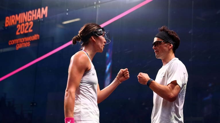 Joelle King and Paul Coll share a moment at the Commonwealth Games.