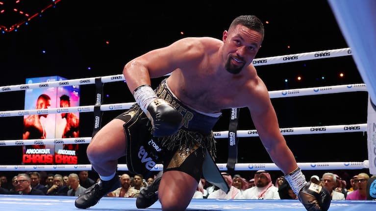Joseph Parker is knocked down by Zhang.