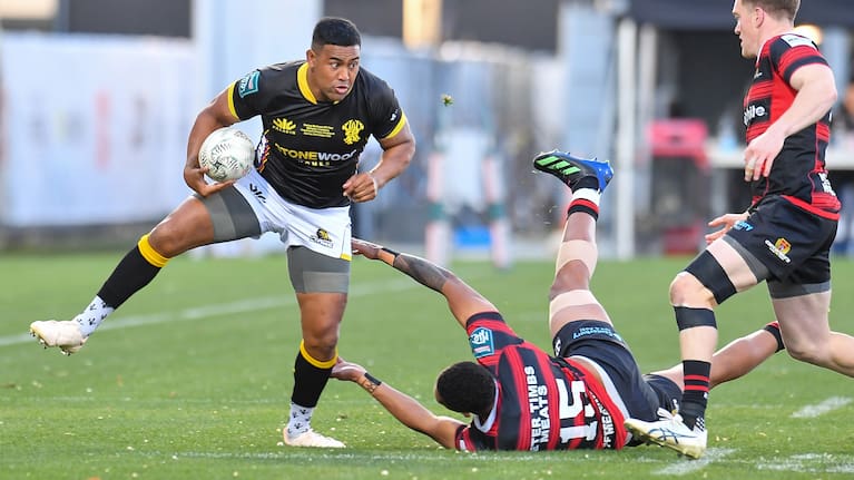 Julian Savea makes a bruising run in the NPC final.