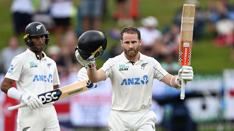 Kane Williamson celebrates his century today against England at Seddon Park in Hamilton.