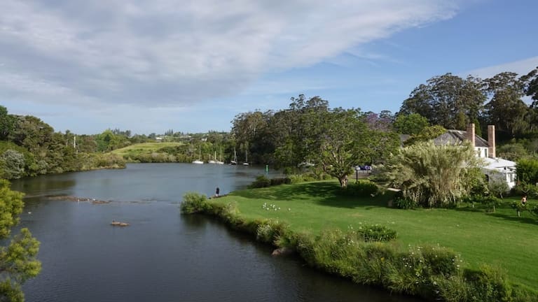Kororipo Pā as seen from the other side of Kerikeri Basin with Kemp House, New Zealand's oldest surviving building, on the right.