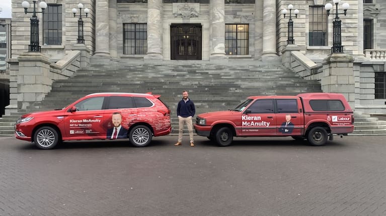 Labour's Kieran McAnulty with his old Mazda Bounty ute and new hybrid Outlander