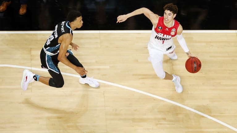 AUCKLAND, NEW ZEALAND - OCTOBER 24: LaMelo Ball of the Hawks drives against RJ Hampton of the Breakers during the round four NBL match between the New Zealand Breakers and the Illawarra Hawks at Spark Arena on October 24, 2019 in Auckland, New Zealand. (Photo by Anthony Au-Yeung/Getty Images)