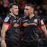Leroy Carter, left, celebrates his try for the Chiefs against the Crusaders in May with Cortez Ratima.
