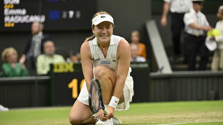 Lulu Sun celebrates her victory over Emma Raducanu on Wimbledon's Centre Court.