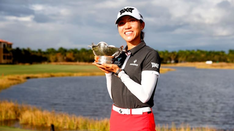 Lydia Ko poses with the Vare Trophy after the final round of the Tour Championship.