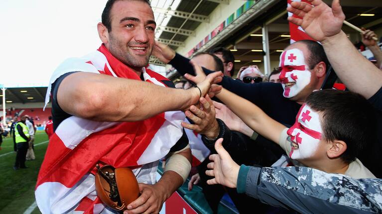 GLOUCESTER, ENGLAND - SEPTEMBER 19: Mamuka Gorgodze of Georgia celebrates his teams win with fans after the 2015 Rugby World Cup Pool C match between Tonga and Georgia at Kingsholm Stadium on September 19, 2015 in Gloucester, United Kingdom. (Photo by Matt Lewis - World Rugby via Getty Images/World Rugby via Getty Images)