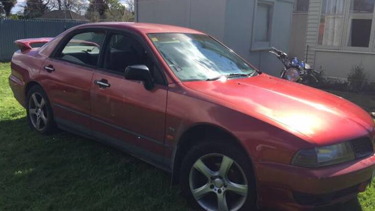 A passenger in the backseat of a fleeing vehicle leaned out his window and pointed a gun at police in Napier.