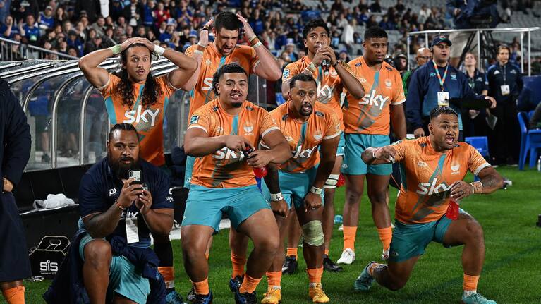 Moana Pasifika's players react in the final minutes of their defeat to the Blues at Eden Park.