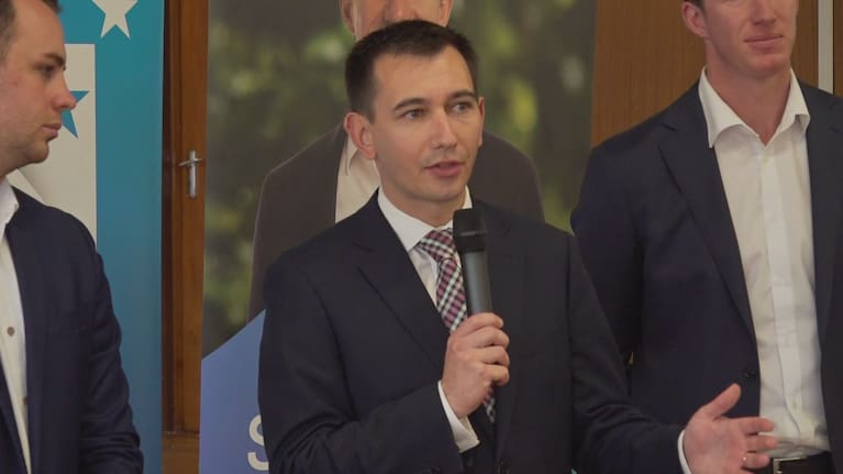 National's Simeon Brown addresses residents in Tauranga.