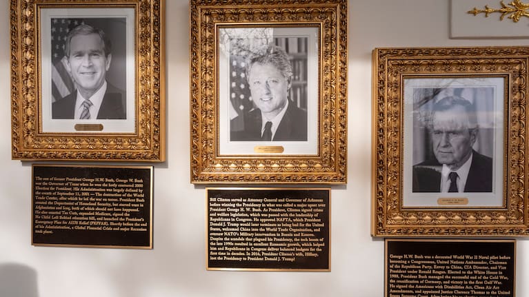 New plaques of explanatory text have been placed underneath presidential portraits on the Colonnade at the White House