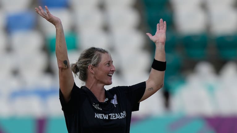 New Zealand's captain Sophie Devine celebrates the wicket of England's Heather Knight during the ICC Women's Cricket World Cup match between England and New Zealand .