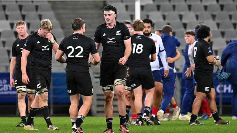 New Zealand under-20 players react at full-time following their 55-31 loss to France under 20s.