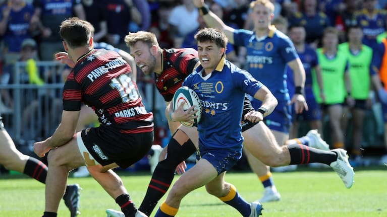Otago halfback Dylan Pledger breaks the line against Canterbury in Christchurch.