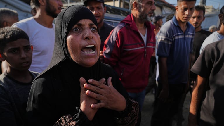 Palestinians mourn during the funeral of their relatives who were killed in an Israeli airstrike on Deir al-Balah, central Gaza Strip, Tuesday, September 30, 2025.