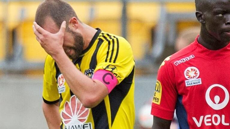 Wellington Phoenix's captain Andrew Durante reacts during their loss to Adelaide United.