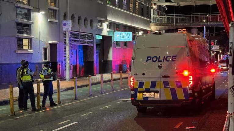 Police outside a Quay St premises following a report of a person being stabbed.