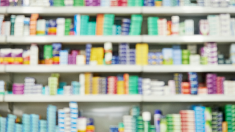 Prescription medicine on a pharmacy shelf.