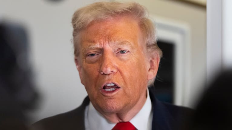 President Donald Trump speaks to the media after boarding Air Force One at Joint Base Andrews
