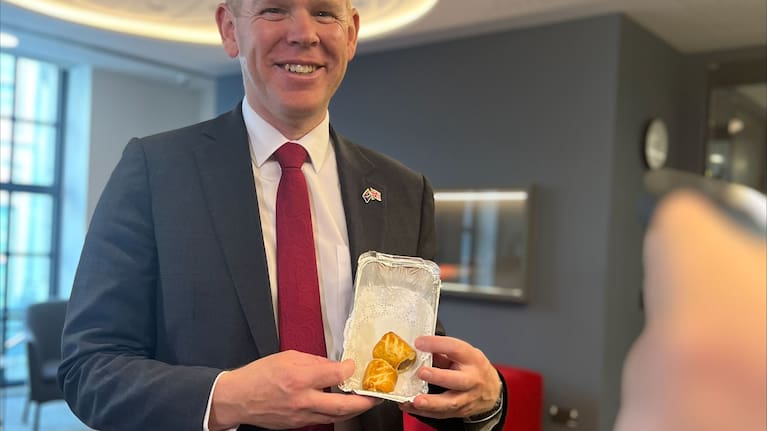 Prime Minister Chris Hipkins met with King Charles overnight and was gifted a warm tray of sausage rolls. 