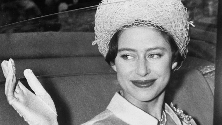 Princess Margaret gives a royal wave.