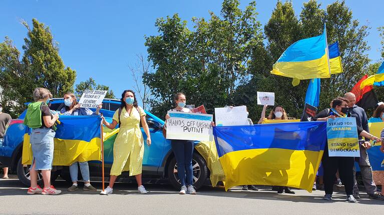 Protesters outside the Embassy of Russia in Wellington on Friday.
