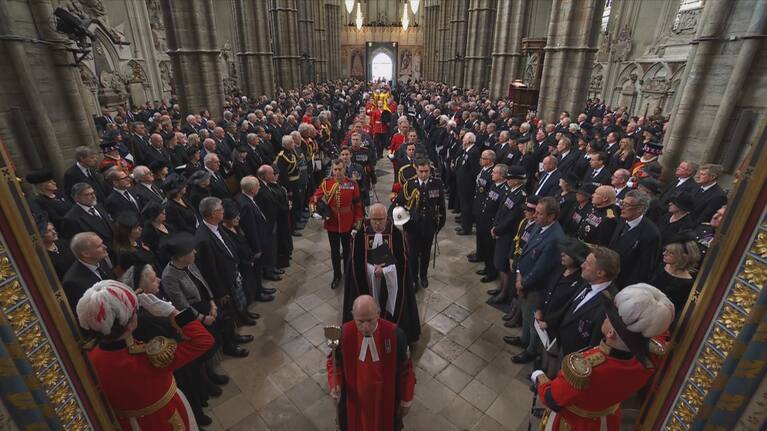 Queen's coffin arrives in Westminster Abbey.