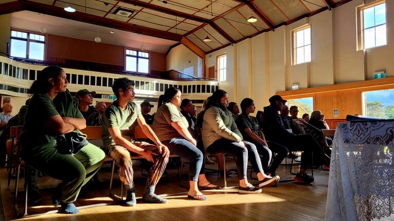 Residents listen at an inquiry into slash and forestry in Tolaga Bay