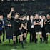 Former All Blacks captain Richie McCaw, never one to shirk from a challenge, acknowledges the Eden Park crowd after his final home Test in 2015.