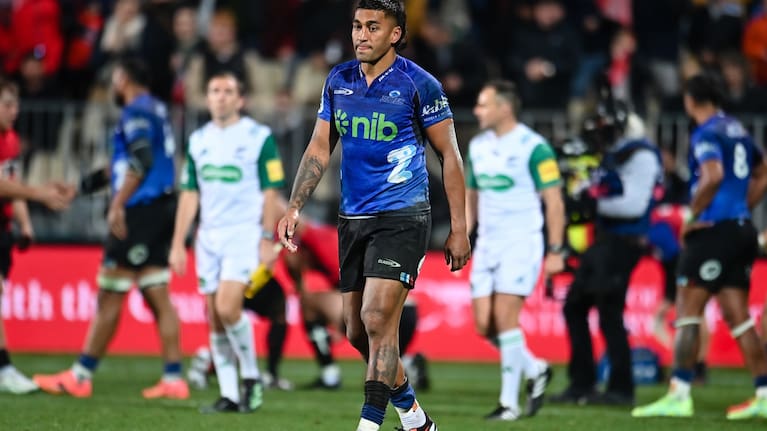A dejected Rieko Ioane walks off after the Blues' defeat to the Crusaders in Christchurch.