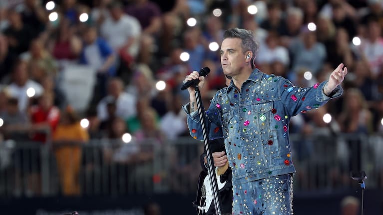 Robbie Williams performs during Soccer Aid for Unicef 2022 at London Stadium on June 12, 2022 in London, England.