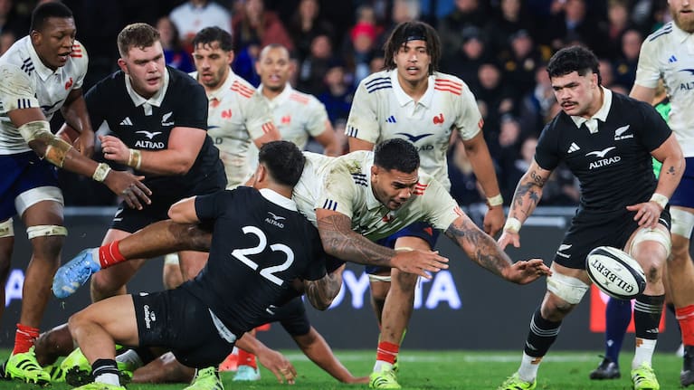 Romain Taofifenua loses the ball as France launch a final attack in Dunedin.