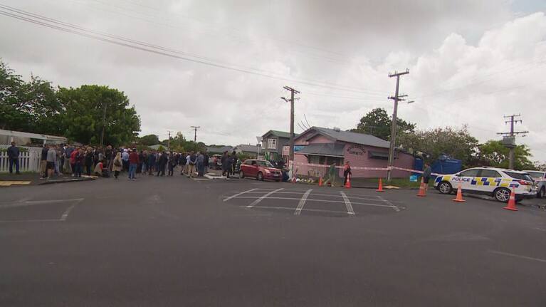Over 100 people gathered outside Sandringham's Rose Cottage Superette this morning.