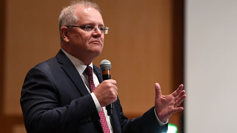 CANBERRA, AUSTRALIA - MAY 12: Australian Prime Minister Scott Morrison addresses members of the Coalition during a Joint Party Room Meeting while adhering to social distancing measures at Parliament House on May 12, 2020 in Canberra, Australia. MPs have gathered in Canberra this week for special sitting days, after the parliamentary sitting schedule was adjourned until August in response to the COVID-19 outbreak. (Photo by Lukas Coch - Pool/Getty Images)