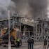 Smoke bellows from a warehouse that caught fire following a Russian attack, Saturday, Oct. 25, 2025, in Kyiv, Ukraine