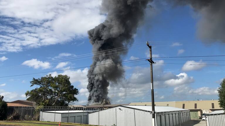 Smoke rising from a scrap metal yard fire on Hunua Road, Papakura.