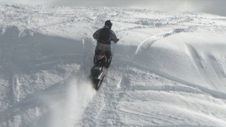 Snowmoto - a new sport on the slopes.