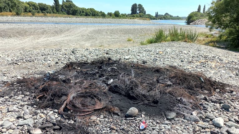 Some of the trash has been burned in large bonfires.