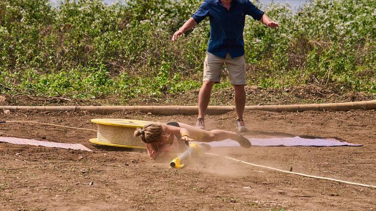 Tess hits the dirt hard at the reward challenge.