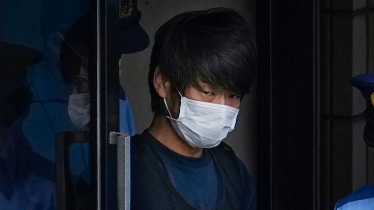 Tetsuya Yamagami, the alleged assassin of Japan's former Prime Minister Shinzo Abe, gets out of a police station in Nara, western Japan, in 2022. (Source: Kyodo News via AP)