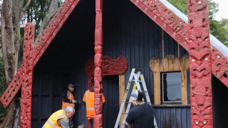 The 100-year-old carvings are removed from Te Wharepuni o Anehana at Anderson Park in Invercargill for restoration. Photo: Supplied / Invercargill City Council